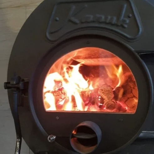 Kanuk1 Classic con laterales perforados y patas rondo 4